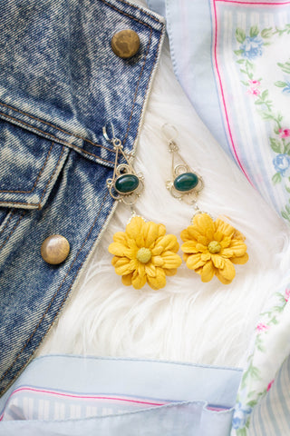 yellow floral and green statement earrings