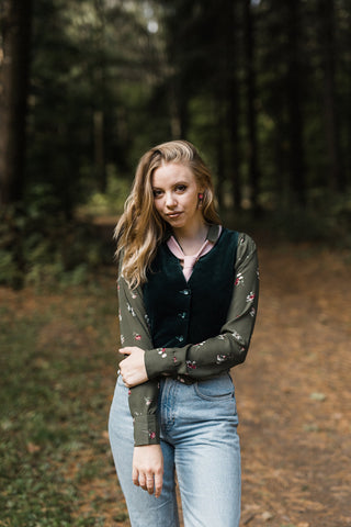 green suede vest, flower blouse, androgynous styling