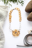 vintage inspired gold and blue sapphire dahlia brooch necklace
