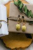 mustard yellow statement vintage earrings handmade in toronto jewelry holiday flat lay image